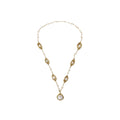 14K gold plated necklace with organic leaf motifs and freshwater pearls arranged in an elegant chain design on neutral background.