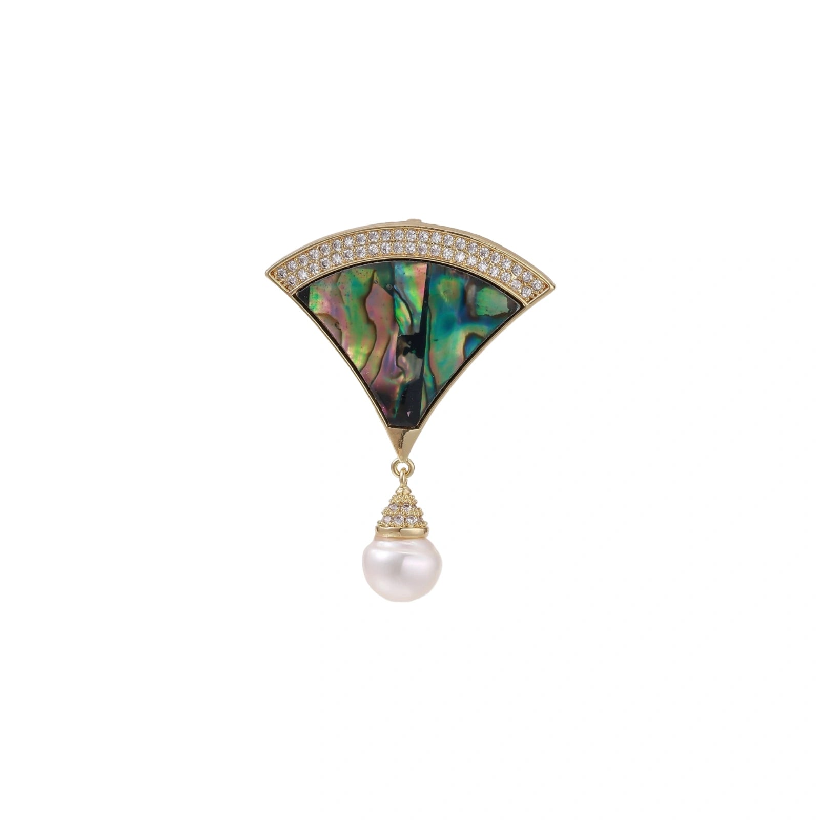 Gold fan-shaped brooch with iridescent abalone shell center, crystal border, and dangling white pearl on cream background