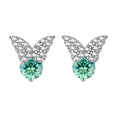 Sterling silver butterfly stud earrings with crystal wings and mint green center stones on cream background.