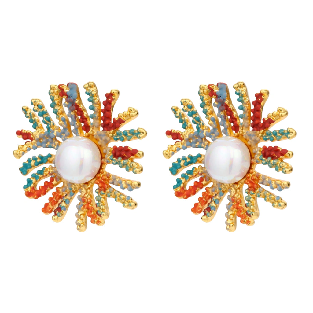 Vibrant starburst stud earrings with multicolor enamel rays and white pearl centers on gold-plated setting